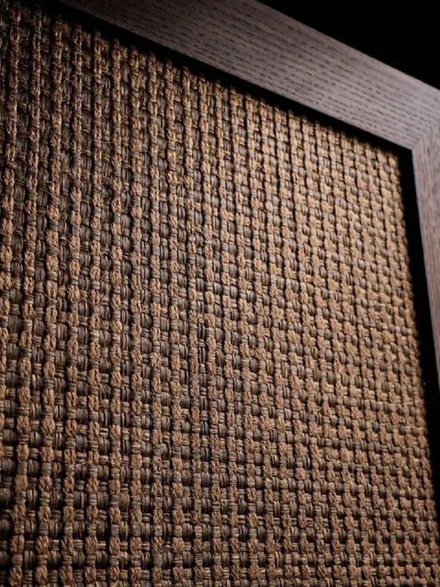 Hand-woven rattan panel set into a timber frame