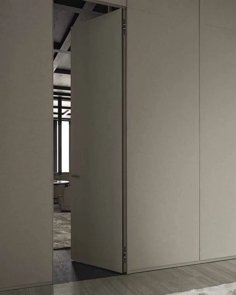 Full-height concealed door with fluted glass and matching frame