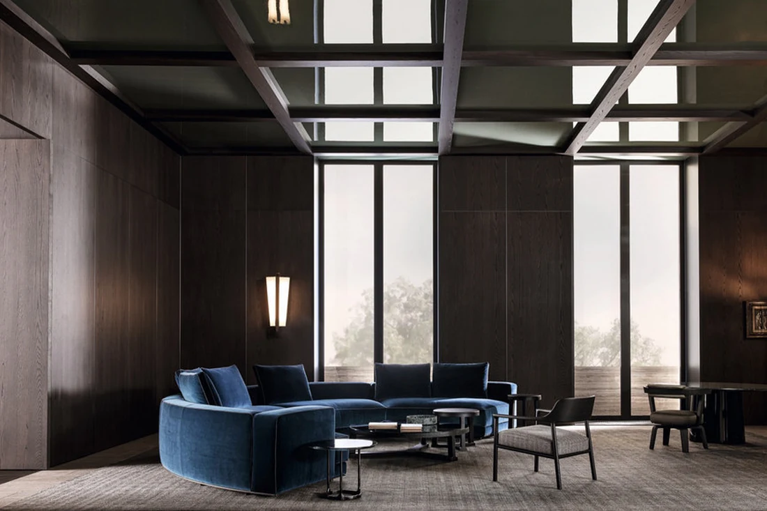 Villa reception room with oak panelling, timber ceiling beams and a concealed door